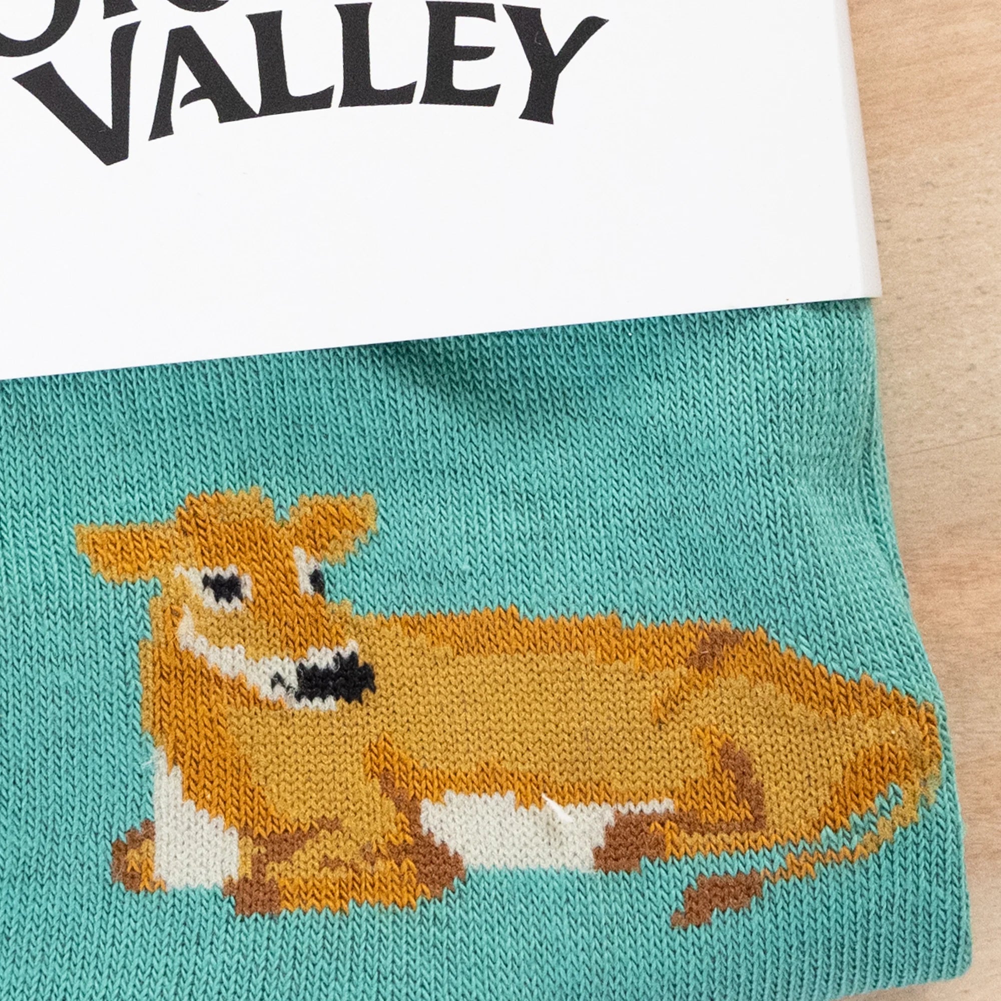 Jersey Cow Socks in Grass color