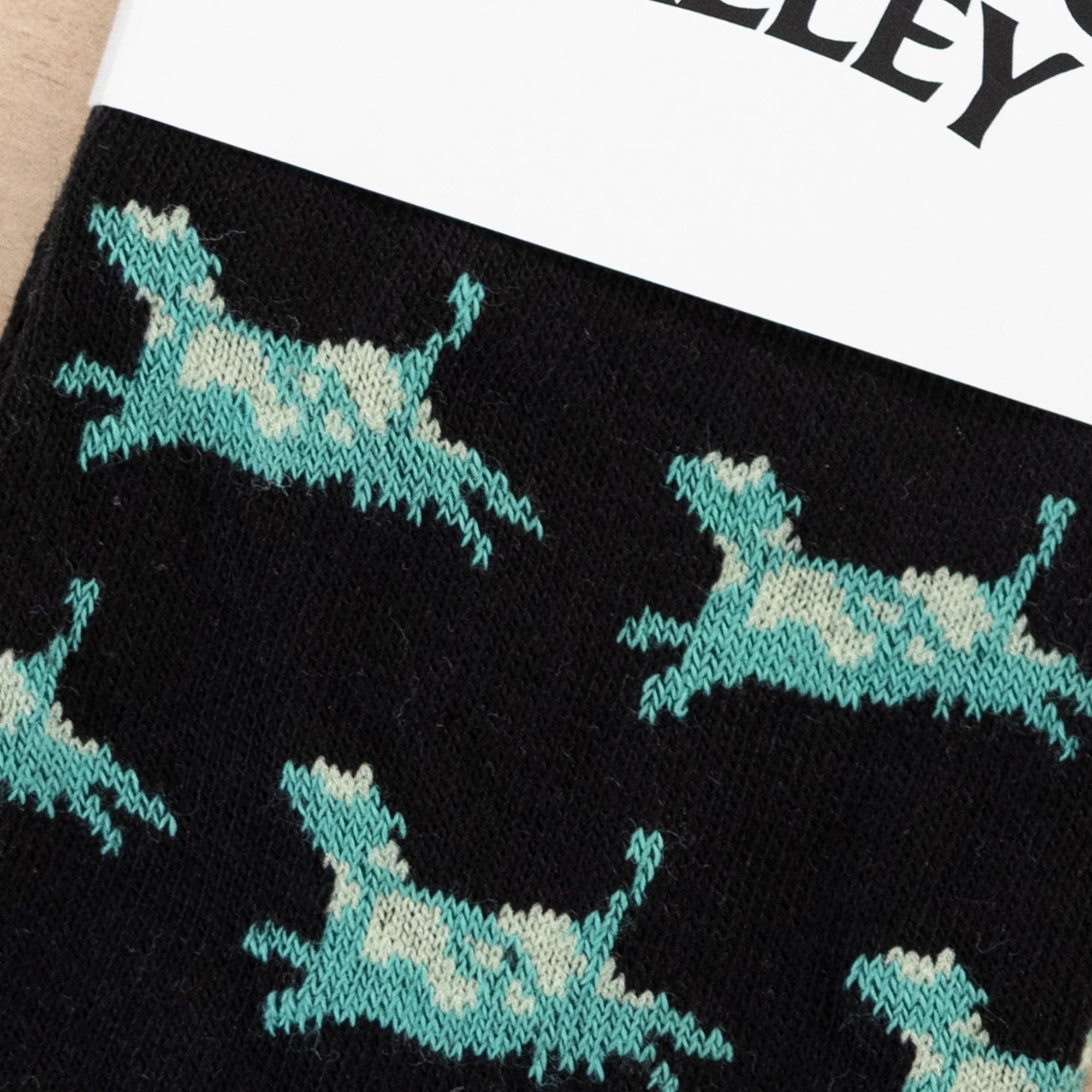 Leaping Cow Socks in Black w/ Green Cows color